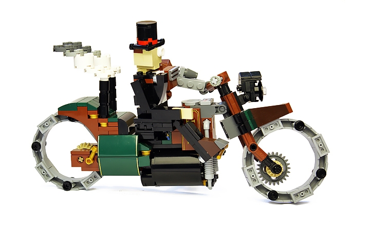LEGO MOC - Steampunk Machine - Thomas Watts' Steam Motorcycle (Miniland): <br>Axle-free wheels with forged steel rim on the electrodynamic suspension are getting out from any scrape, be it rocks or quicksand.<br><br />
