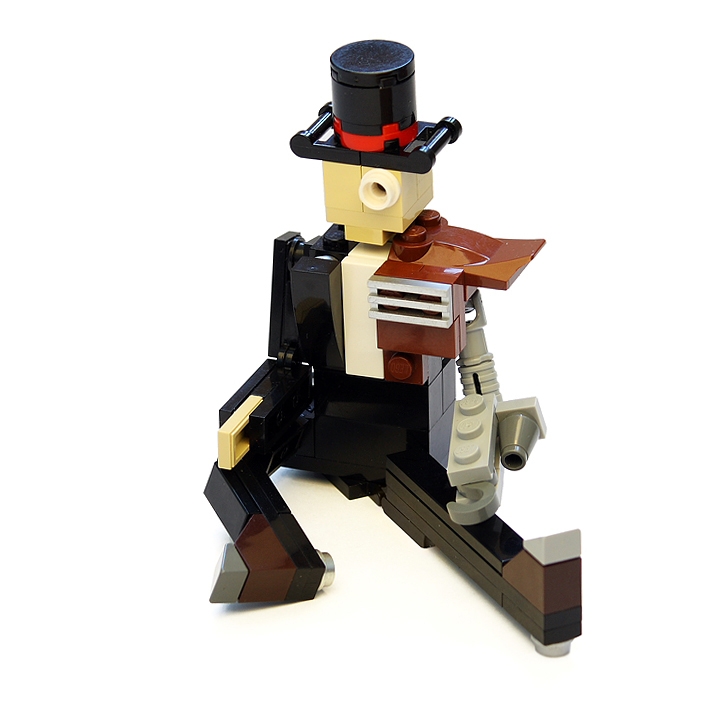LEGO MOC - Steampunk Machine - Thomas Watts' Steam Motorcycle (Miniland): <br>Sir Thomas James Watt with his customary top hat and a monocle.<br>