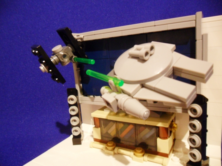 LEGO MOC - 16x16: Technics - Автостереоскопия - 3D-технологии XXI века: Как раз в этот момент по телевизору показывали очередной эпизод 'Звездных Войн'. Но в любой момент можно выбрать фильм из обширной видеотеки, которая располагается в шкафчике под телевизором.