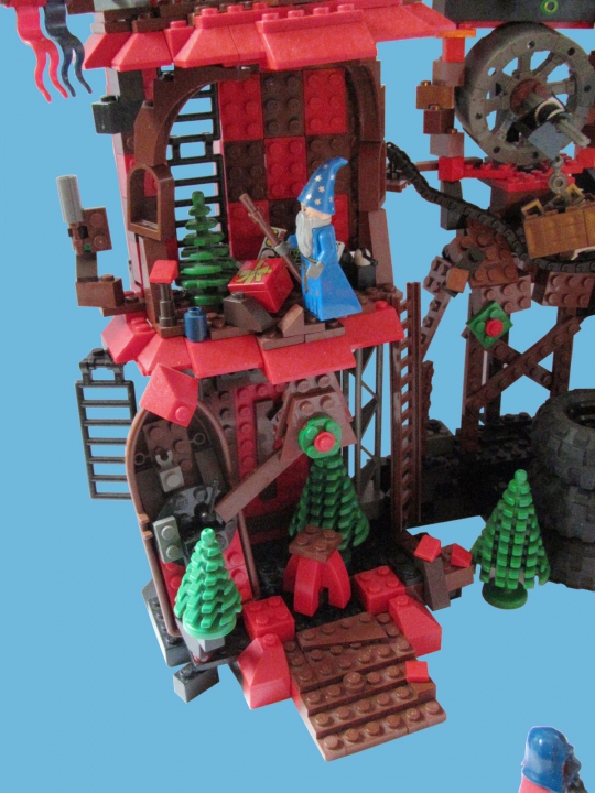 LEGO MOC - New Year's Brick 3015 - Фабрика елочных игрушек V112-184-221PHD: Это главная башня фабрики, тут роботы следят за производственным процессом, однако сейчас они празднуют Новый Год около елки, а тем временем Дед Мороз Синий Нос проникает в башню и оставляет роботам подарки 