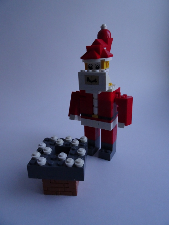 LEGO MOC - New Year's Brick 2016 - Гомер Симпсон в образе Санты Клауса : Гомер хочет пролезть к себе домой в костюме Санты через дымоход камина ,  что бы обрадывать своих детей , но что то мне подсказывает , что это  у него не получится ...