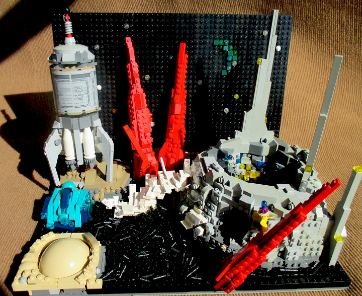 LEGO MOC - Russian Tales' Wonders - Dunno on a Moon: -- Что это? -- недоумевал Незнайка. -- Не то дым, не то пыль! Может быть, какой-нибудь вулкан внизу? -- Ну вот, я так и знал, что мы в конце концов угодим в вулкан! -- проворчал Пончик. -- Откуда ты это знал? -- удивился Незнайка. Но Пончик на этот вопрос не успел ответить. Как раз в этот момент ракета опустилась на поверхность Луны. Произошел толчок. Не удержавшись на ногах, Незнайка и Пончик покатились на пол кабины. Некоторое время они сидели на полу и молча глядели друг на друга. Наконец Незнайка сказал: -- Прилетели!