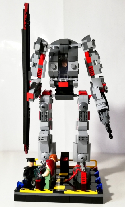 LEGO MOC - 16x16: Mech - Танатос-5000: Общий вид меха. Так как в нем нет системы катапультирования, было решено создать реактивные сапоги, с помощью которых мы могли быстро покинуть меха, при это не разбившись о землю. С помощью них же мы забираемся наверх. Быть рейнджером прекрасно тем, что реактивные движки вмонтированы в костюм, и тебе не приходится носить огромные неудобные сапоги. Хотя, конечно, сапоги стоят гораздо дешевле, да и ремонт легче в разы...