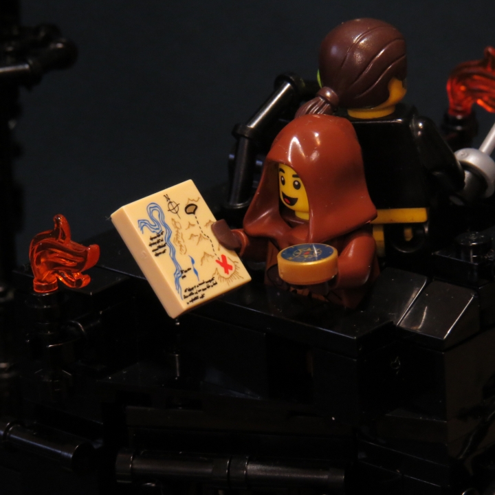 LEGO MOC - LEGO-contest 24x24: 'Pirates' - Черная акула династии МакШарков: Бенджамин МакШарк учится владеть компасом на практике и изучает карту сокровищ.